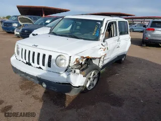 2015 Jeep Patriot Sport with VIN 1C4NJPBB2FD157427, listed as a IAAI auction lot 41819957 with 106,614 mi miles. Bid and sale history available at carsss.com. Image 2.