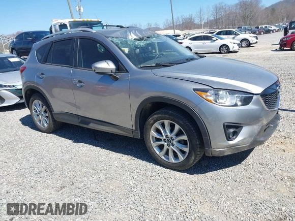 2014 Mazda CX-5 Grand Touring with VIN JM3KE4DY3E0368169, listed as a IAAI auction lot 41857976 with 127,853 mi miles. Bid and sale history available at carsss.com. Image 1.