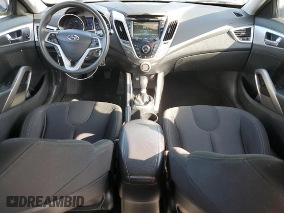 2012 Hyundai Veloster w/Gray Int z VIN KMHTC6AD1CU066882, wystawiony jako Copart lot #55781745 z przebiegiem 167 427 mil mil oraz Czysty tytuł • Clean title. Historia ofert i sprzedaży dostępna na DreamBid. Obrazek 8.