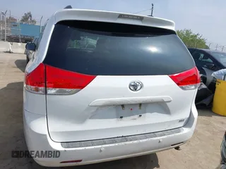 2014 Toyota Sienna XLE z VIN 5TDYK3DC7ES461445, wystawiony jako IAAI lot #42003360 z przebiegiem 153 404 mil mil oraz . Historia ofert i sprzedaży dostępna na DreamBid. Obrazek 17.