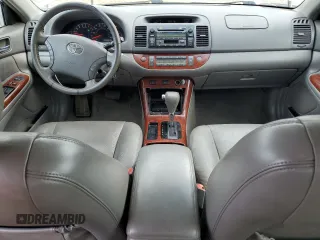 2006 Toyota Camry STD with VIN 4T1BE30KX6U651615, listed as a Copart auction lot 57497475 with 214,031 mi miles and Salvage title. Bid and sale history available at DreamBid. Image 8.