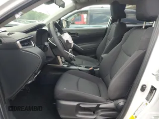 2023 Toyota Corolla Cross LE with VIN 7MUCAAAG2PV053730, listed as a Copart auction lot 54825035 with 33,313 mi miles and Salvage title. Bid and sale history available at DreamBid. Image 7.
