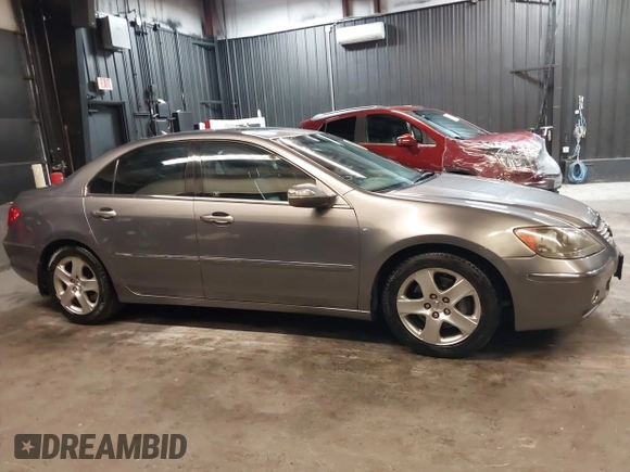 2006 Acura RL z VIN JH4KB165X6C009547, wystawiony jako IAAI lot #42073784 z przebiegiem 190 601 mil mil oraz . Historia ofert i sprzedaży dostępna na DreamBid. Obrazek 14.
