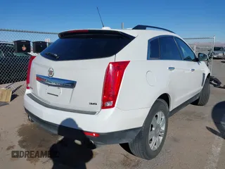 2015 Cadillac SRX with VIN 3GYFNAE34FS557297, listed as a IAAI auction lot 41388573 with 124,185 mi miles and . Bid and sale history available at DreamBid. Image 4.