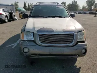 2005 GMC Envoy SLT with VIN 1GKDS13S952382088, listed as a Copart auction lot 64765154 with 177,333 mi miles and Salvage Title. Bid and sale history available at carsss.com. Image 11.