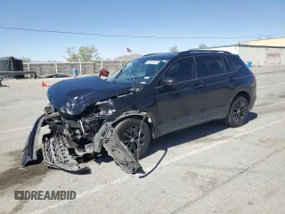 2020 Volkswagen Tiguan S with VIN 3VV1B7AX5LM015633, listed as a Copart auction lot 55291145 with 59,225 mi miles and Salvage title. Bid and sale history available at DreamBid. Image 1.