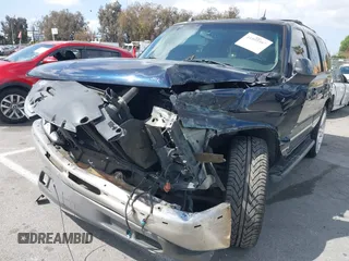2005 Chevrolet Tahoe Z71 z VIN 1GNEC13T95R192599, wystawiony jako IAAI lot #41955397 z przebiegiem 179 292 mil mil oraz . Historia ofert i sprzedaży dostępna na DreamBid. Obrazek 6.