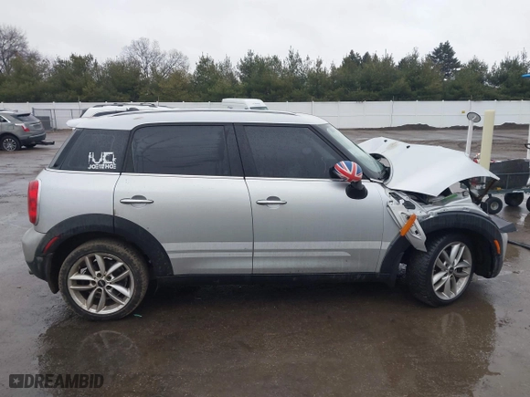 2013 MINI Cooper Countryman with VIN WMWZB3C5XDWR35844, listed as a IAAI auction lot 41203877 with 118,000 mi miles. Bid and sale history available at carsss.com. Image 14.