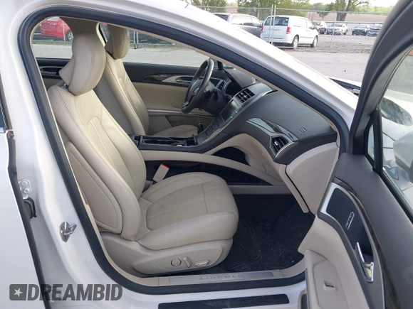 2016 Lincoln MKZ with VIN 3LN6L2JK0GR627283, listed as a IAAI auction lot 42271206 with 52,890 mi miles and . Bid and sale history available at DreamBid. Image 5.