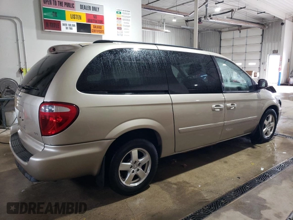 2007 Dodge Grand Caravan SXT with VIN 2D8GP44L57R321927, listed as a Copart auction lot 53143605 with 157,185 mi miles and Salvage Title. Bid and sale history available at DreamBid. Image 3.