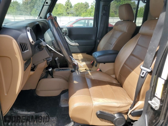 2011 Jeep Wrangler Unlimited Rubicon with VIN 1J4BA6H16BL561658, listed as a Copart auction lot 58379755 with 103,587 mi miles and Salvage title. Bid and sale history available at DreamBid. Image 7.
