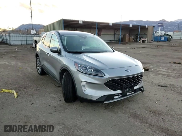 2021 Ford Escape Titanium with VIN 1FMCU9J97MUA70995, listed as a Copart auction lot 87004884 with Not Provided miles and Salvage Title. Bid and sale history available at carsss.com. Image 11.