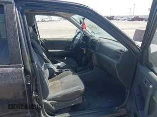 1998 Honda Passport LX with VIN 4S6CK58W7W4407105, listed as a IAAI auction lot 41831708 with 286,061 mi miles. Bid and sale history available at carsss.com. Image 5.
