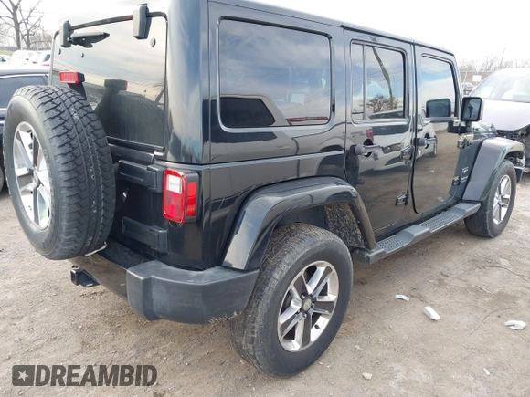 2016 Jeep Wrangler Unlimited 75th Anniversary with VIN 1C4BJWEG1GL221873, listed as a IAAI auction lot 41635788 with 148,493 mi miles. Bid and sale history available at carsss.com. Image 4.