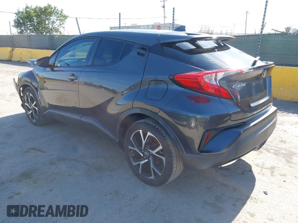 2018 Toyota C-HR XLE with VIN NMTKHMBX4JR024785, listed as a IAAI auction lot 42386488 with 83,230 mi miles and . Bid and sale history available at DreamBid. Image 3.