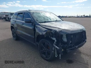 2015 Jeep Grand Cherokee Altitude z VIN 1C4RJFAG1FC676418, wystawiony jako IAAI lot #42686778 z przebiegiem Nie podano mil oraz . Historia ofert i sprzedaży dostępna na DreamBid. Obrazek 1.