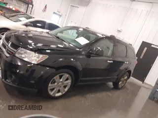 2014 Dodge Journey Limited with VIN 3C4PDDDG7ET154300, listed as a IAAI auction lot 41640132 with 175,276 mi miles and . Bid and sale history available at DreamBid. Image 14.