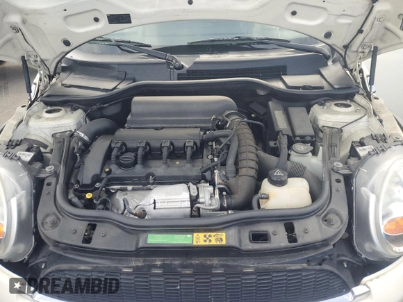 2010 MINI Hardtop S with VIN WMWMF7C59ATZ69213, listed as a Copart auction lot 54270705 with 77,594 mi miles and Salvage Title. Bid and sale history available at DreamBid. Image 11.