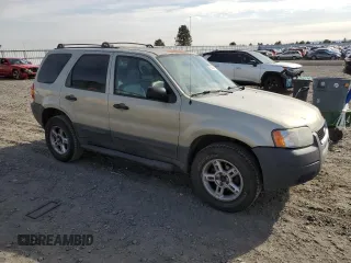 2003 Ford Escape XLT Popular 2 with VIN 1FMYU93143KC64939, listed as a Copart auction lot 75284884 with 147,352 mi miles and Salvage Title. Bid and sale history available at carsss.com. Image 4.