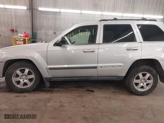 2009 Jeep Grand Cherokee Laredo with VIN 1J8GR48KX9C516873, listed as a IAAI auction lot 41610781 with 199,246 mi miles. Bid and sale history available at carsss.com. Image 14.