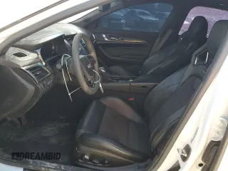 2017 Cadillac CTS-V z VIN 1G6A15S65H0216411, wystawiony jako Copart lot #72227484 z przebiegiem 57 241 mil mil oraz Szkody całkowita. Historia ofert i sprzedaży dostępna na DreamBid. Obrazek 7.