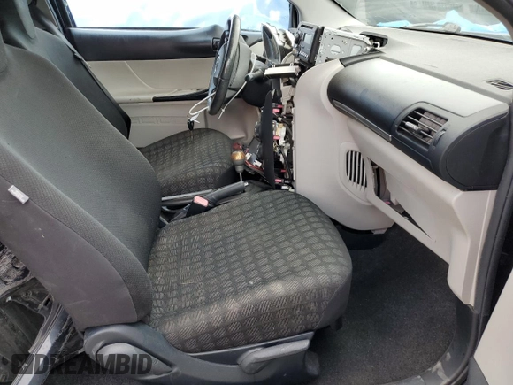 2012 Scion iQ z VIN JTNJJXB05CJ017720, wystawiony jako Copart lot #56152325 z przebiegiem 164 031 mil mil oraz Szkoda całkowita • Salvage title. Historia ofert i sprzedaży dostępna na DreamBid. Obrazek 7.
