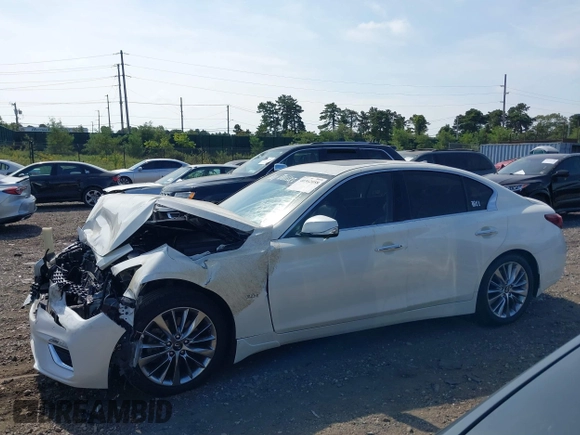 2019 Infiniti Q50 Luxe with VIN JN1EV7ARXKM557946, listed as a IAAI auction lot 40362058 with 56,615 mi miles and . Bid and sale history available at carsss.com. Image 14.
