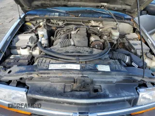 2001 Chevrolet S-10 LS with VIN 1GCCS19571K141956, listed as a Copart auction lot 87008824 with 110,035 mi miles and Clean Title. Bid and sale history available at DreamBid. Image 11.