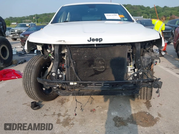 2018 Jeep Grand Cherokee Laredo with VIN 1C4RJFAGXJC121900, listed as a IAAI auction lot 42429505 with 72,351 mi miles and . Bid and sale history available at DreamBid. Image 6.