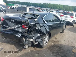 2014 Infiniti Q50 z VIN JN1BV7AP7EM677449, wystawiony jako IAAI lot #42278173 z przebiegiem 116 357 mil mil oraz . Historia ofert i sprzedaży dostępna na DreamBid. Obrazek 4.