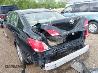 2007 Toyota Avalon XL z VIN 4T1BK36B87U184714, wystawiony jako IAAI lot #42243997 z przebiegiem 165 691 mil mil oraz . Historia ofert i sprzedaży dostępna na DreamBid. Obrazek 6.