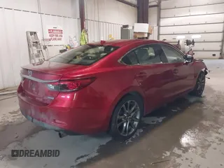2017 Mazda 6 Grand Touring with VIN JM1GL1X57H1135401, listed as a IAAI auction lot 41722330 with 100,869 mi miles. Bid and sale history available at carsss.com. Image 4.