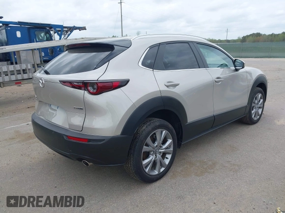 2023 Mazda CX-30 2.5 S Carbon Edition with VIN 3MVDMBCM1PM580204, listed as a IAAI auction lot 41905407 with 11,455 mi miles. Bid and sale history available at carsss.com. Image 4.