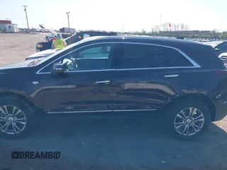 2021 Cadillac XT5 FWD Premium Luxury with VIN 1GYKNCRSXMZ118990, listed as a IAAI auction lot 41991857 with 92,085 mi miles and . Bid and sale history available at DreamBid. Image 14.