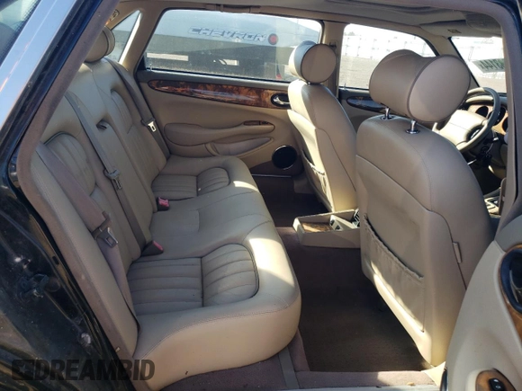 2001 Jaguar XJ with VIN SAJDA23C31LF28667, listed as a Copart auction lot 76983144 with 87,542 mi miles and Clean title. Bid and sale history available at DreamBid. Image 10.
