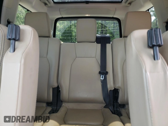 2016 Land Rover LR4 HSE Lux z VIN SALAK2V69GA784943, wystawiony jako Copart lot #61089295 z przebiegiem 125 885 mil mil oraz Szkoda całkowita • Salvage title. Historia ofert i sprzedaży dostępna na DreamBid. Obrazek 10.