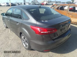 2017 Ford Focus SE with VIN 1FADP3FE3HL295192, listed as a IAAI auction lot 42664709 with 47,589 mi miles and . Bid and sale history available at DreamBid. Image 3.