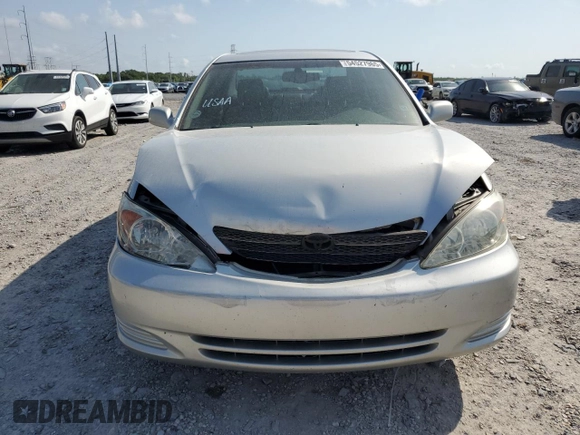 2002 Toyota Camry XLE z VIN 4T1BF32K22U532171, wystawiony jako Copart lot #54527965 z przebiegiem 165 637 mil mil oraz Szkoda całkowita • Salvage title. Historia ofert i sprzedaży dostępna na DreamBid. Obrazek 5.