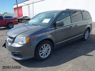 2019 Dodge Grand Caravan SXT with VIN 2C4RDGCG5KR758602, listed as a IAAI auction lot 42033617 with 186,351 mi miles. Bid and sale history available at carsss.com. Image 2.