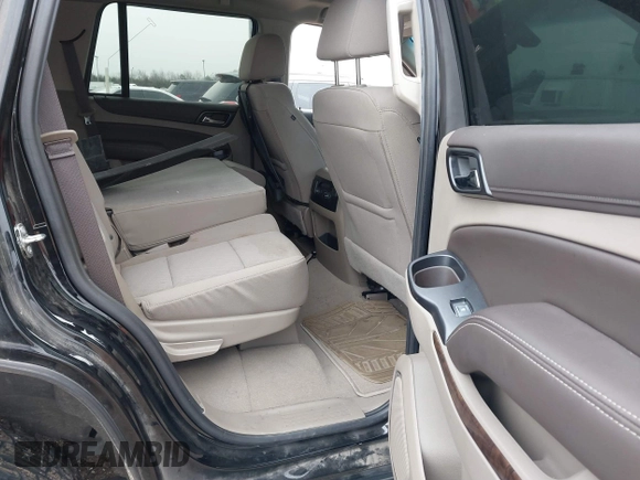2020 Chevrolet Tahoe LS z VIN 1GNSCAKC1LR177807, wystawiony jako IAAI lot #41482578 z przebiegiem 75 010 mil mil oraz . Historia ofert i sprzedaży dostępna na DreamBid. Obrazek 8.