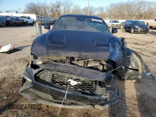 2021 Ford Mustang EcoBoost with VIN 1FA6P8TH5M5151498, listed as a Copart auction lot 45869345 with 56,805 mi miles and Salvage Title. Bid and sale history available at carsss.com. Image 5.