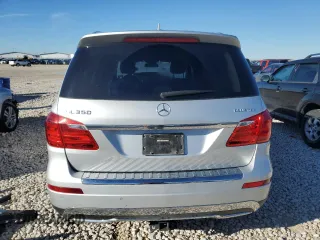 2016 Mercedes-Benz GL with VIN 4JGDF2EE8GA699202, listed as a Copart auction lot 87868775 with 203,455 mi miles and Salvage Title. Bid and sale history available at carsss.com. Image 6.