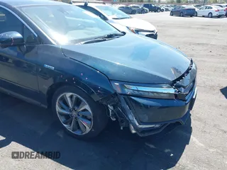 2018 Honda Clarity Touring with VIN JHMZC5F3XJC006383, listed as a IAAI auction lot 41996524 with 100,646 mi miles and . Bid and sale history available at DreamBid. Image 6.