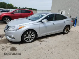 2014 Hyundai Azera Limited with VIN KMHFH4JG1EA423897, listed as a Copart auction lot 64299715 with 129,381 mi miles and Non repairable. Bid and sale history available at DreamBid. Image 1.