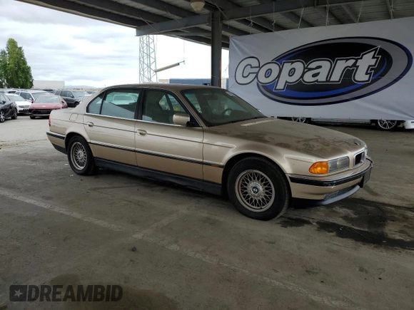 1998 BMW 7 Series 740il with VIN WBAGJ832XWDM11394, listed as a Copart auction lot 54390685 with 126,828 mi miles and Clean Title. Bid and sale history available at carsss.com. Image 4.
