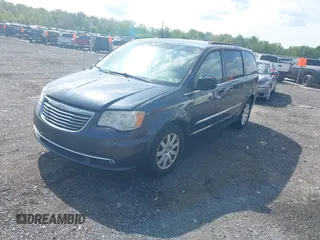 2014 Chrysler Town & Country Touring with VIN 2C4RC1BG0ER461081, listed as a IAAI auction lot 42157023 with 220,955 mi miles. Bid and sale history available at carsss.com. Image 2.
