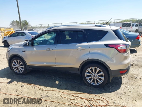 2017 Ford Escape Titanium with VIN 1FMCU9JD3HUC90273, listed as a IAAI auction lot 41828236 with 71,351 mi miles. Bid and sale history available at carsss.com. Image 13.