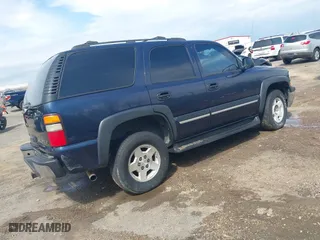 2004 Chevrolet Tahoe LT with VIN 1GNEC13Z84R209220, listed as a IAAI auction lot 41867643 with 385,229 mi miles. Bid and sale history available at carsss.com. Image 4.