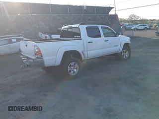 2014 Toyota Tacoma with VIN 5TFLU4EN7EX091618, listed as a IAAI auction lot 41774286 with Not Provided miles and . Bid and sale history available at DreamBid. Image 4.