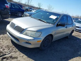 2002 Mitsubishi Lancer ES with VIN JA3AJ26E52U022764, listed as a IAAI auction lot 41763763 with 120,493 mi miles. Bid and sale history available at carsss.com. Image 2.